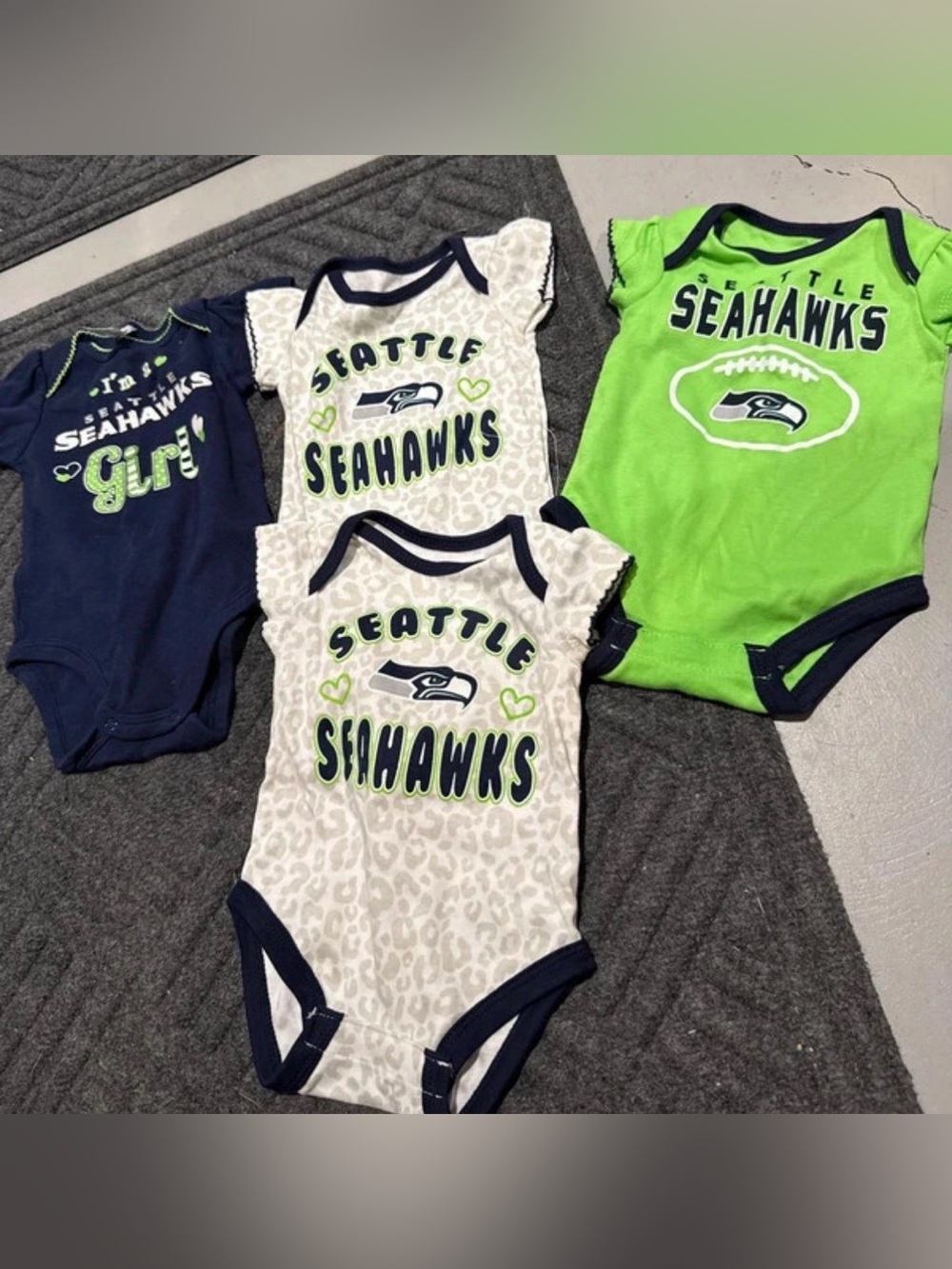 NWOT Seattle Seahawks baby onesies